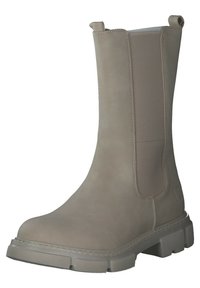 Bottine beige avec une finition en cuir lisse, panneaux latéraux en élasthanne et semelle en caoutchouc épaisse. Elle présente un bout rond et des détails en couture.