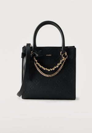 Sac à main carré noir avec motifs géométriques embossés, détail chaîne dorée, petites poignées supérieures et une bandoulière, marque ALDO.