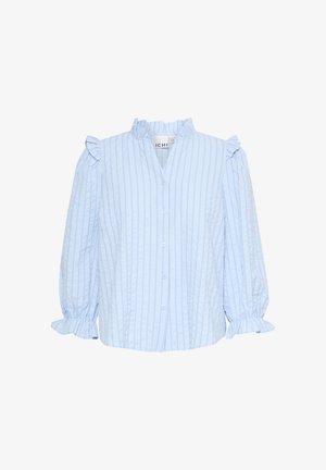 Gaiši zila krekla blūze ar vertikālām svītrām. Aprīkota ar rāpojošu augstu apkakli un pūkainām piedurknēm ar elastīgām aprocēm. Mīksta auduma tekstūra.