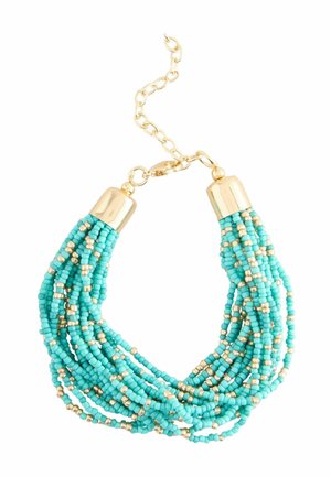 Multi-strand bracelet with small turquoise and gold beads, gold-tone caps, and adjustable gold chain clasp.