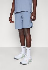 Nike Performance UNLIMITED - Spordišortsid - ashen slate/black