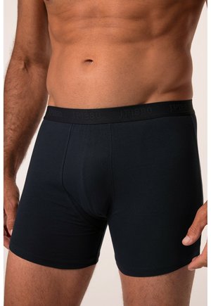 Boxers en coton noir avec une ceinture élastique douce gaufrée portant la mention "JP1880". Design près du corps, texture lisse et sans motifs visibles.