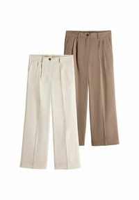 Helle beige und braune weit geschnittene Hose mit Knopfverschluss und Falten, aus weichem Stoff mit glatter Textur.