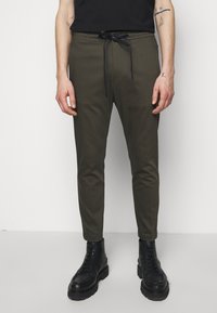 DRYKORN JEGER - Calças - mottled olive