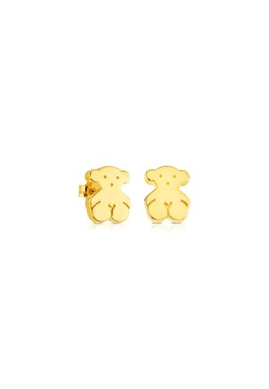 Orecchini a forma di orso in oro, con una finitura lucida, caratterizzati da bordi arrotondati e piccoli dettagli facciali. Costruzione resistente e chiusura sicura.