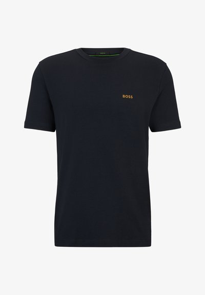 T-shirt en coton bleu marine avec manches courtes, col rond et un petit logo doré "BOSS" sur la poitrine. Texture douce, style décontracté.