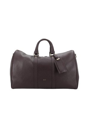 Dark burgundy leather duffel bag with a pebbled texture, two rounded handles, a detachable strap, and gold-tone hardware accents.