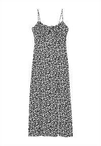 Robe sans manches noir et blanc avec un motif léopard, présentant une poitrine froncée et une silhouette droite et fluide.