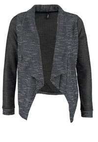 Svart och grå öppen cardigan med texturerad stickning, en draperad silhuett, långa ärmar och ett subtilt vågmönster genom hela plagget.