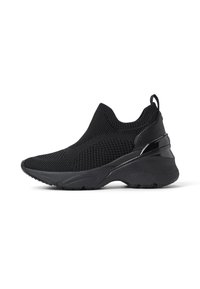 Black athletic shoes featuring a textured mesh upper, a sleek design, padded ankle collar, and a glossy accent on the heel.