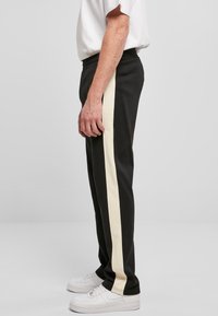 Urban Classics Pantaloni de trening - black