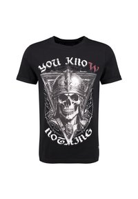 Camiseta de algodón negra con un gráfico de un skull con un casco y el texto "NO SABES NADA" en blanco y rojo. Mangas cortas, cuello redondo.