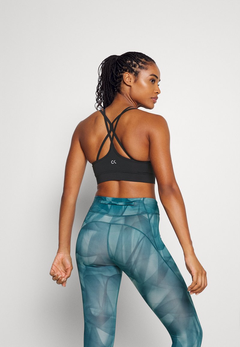 Damen Sportbekleidung | Calvin Klein Performance LOW SUPPORT BRA Sport-BH mit leichter Stützkraft black/schwarz - SI35917 Damen Sportbekleidung | Calvin Klein Performance LOW SUPPORT BRA Sport-BH mit leichter Stützkraft black/schwarz - SI35917