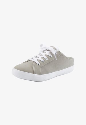 Light grey canvas sneaker with white rubber sole and laces, featuring a low-cut design and textured upper surface.