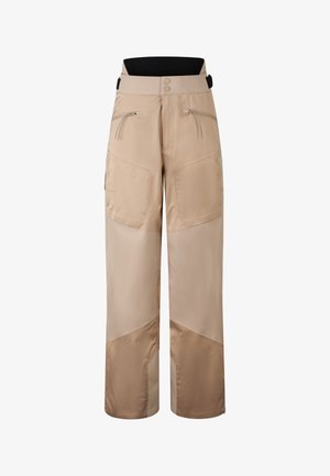Pantalon d'extérieur beige à coupe large, avec poches zippées et textures de panneaux contrastées. Ceinture élastique pour un ajustement réglable.
