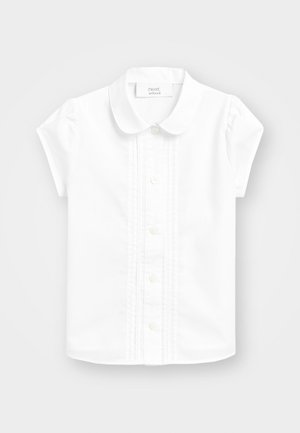 Bela kratka majica s kratkimi rokavi in ovratnikom, ki ima spredaj zapenjanje na gumbe in okrasno šivanje po sredini. Gladko bombažno blago.