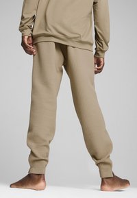 Puma STUDIO TEXTURE  - Trainingsbroek - oak branch