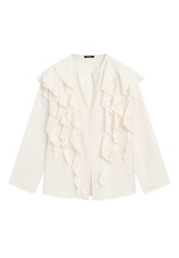 Crème blouse met lange mouwen, voorzien van gelaagde voorkant ruffles en met stof bedekte knopen in het midden.