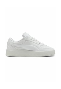White leather sneaker with a flat sole and textured rubber accents. Features a padded collar and flat laces. Minimalist design.