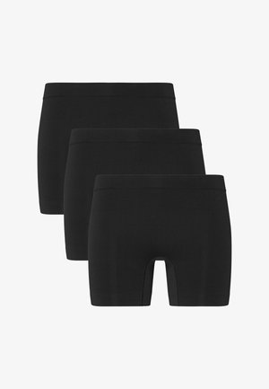 Sæt med tre sorte boksershorts lavet af elastisk stof. Har en bred elastik i taljen og knælange ben uden synlige mønstre eller detaljer.