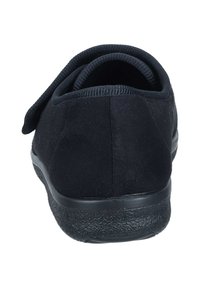 Black, suede slip-on shoe with a cushioned back and textured rubber sole. Features a soft fabric lining and Velcro strap for easy adjustability.