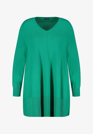 Groene gebreide trui met een V-hals, lange mouwen en een losse pasvorm. Voorzien van geribde boorden bij de mouwen en zoom met een subtiele structuur.