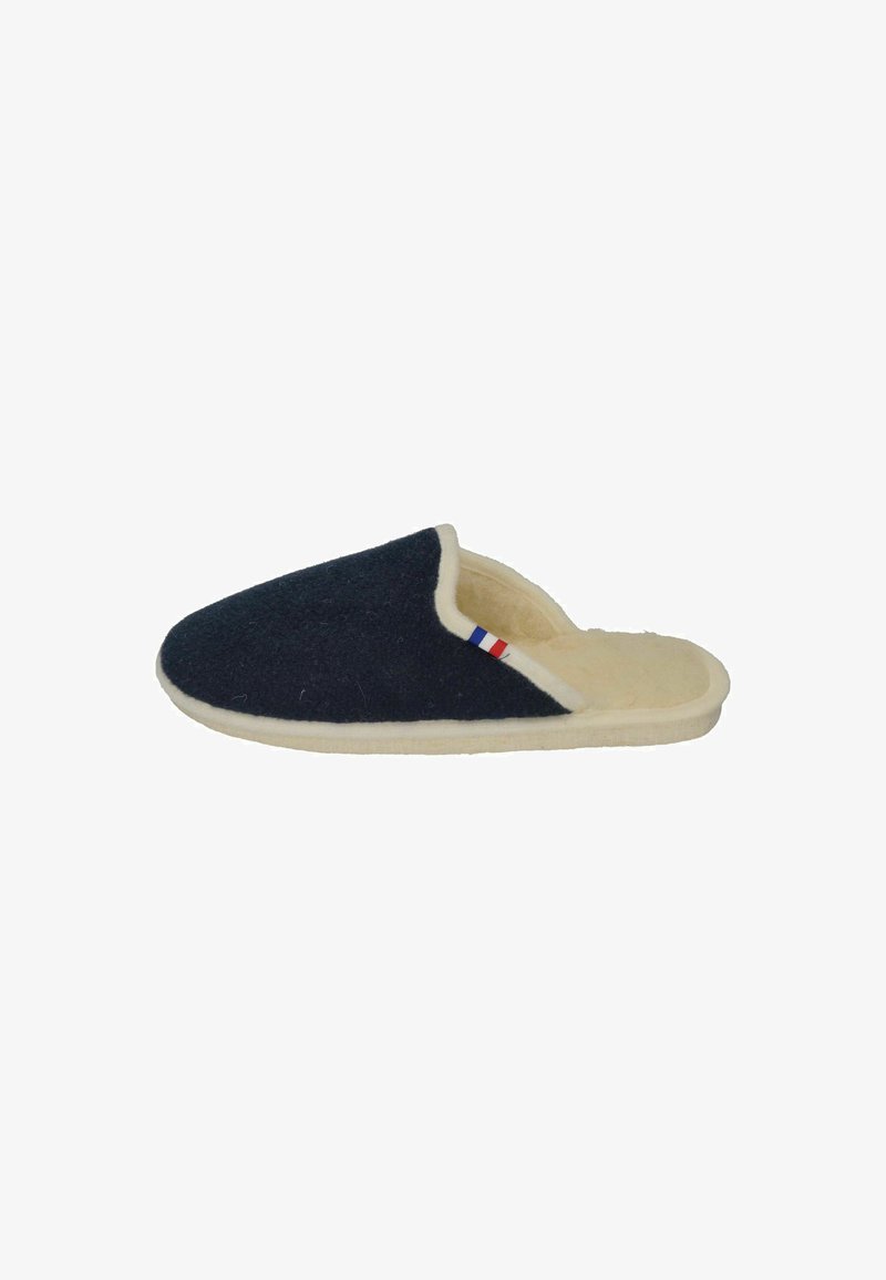 Dark navy wool slipper with beige fur lining, rounded shape, and white sole. Features a small tri-color accent on the side.