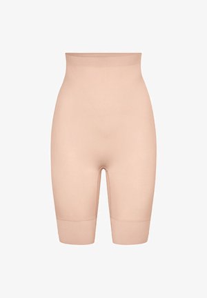 Sømløse beige shaping-shorts med høy midje og midt på låret lengde, designet for jevn kroppsforming og komfortabel passform.
