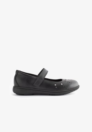 Schwarze Leder-Mary-Jane-Schuhe mit runder Spitze, Klettverschluss, Stern-Ausschnitten und dekorativen metallischen Akzenten auf dem Obermaterial. Flache Sohle.