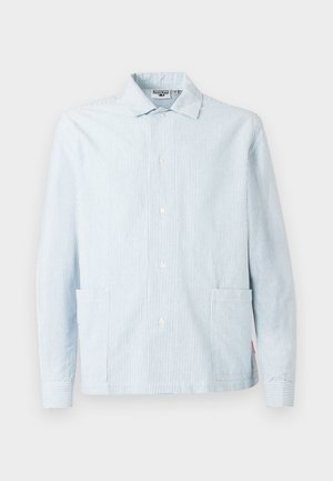 Light blue striped shirt with a collar, front buttons, and two side pockets. Made from fabric with a smooth texture and contrasting stripes.