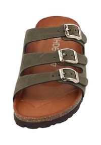 Green suede sandal with three adjustable straps, silver buckles, and a brown cork sole. Features a smooth inner footbed.