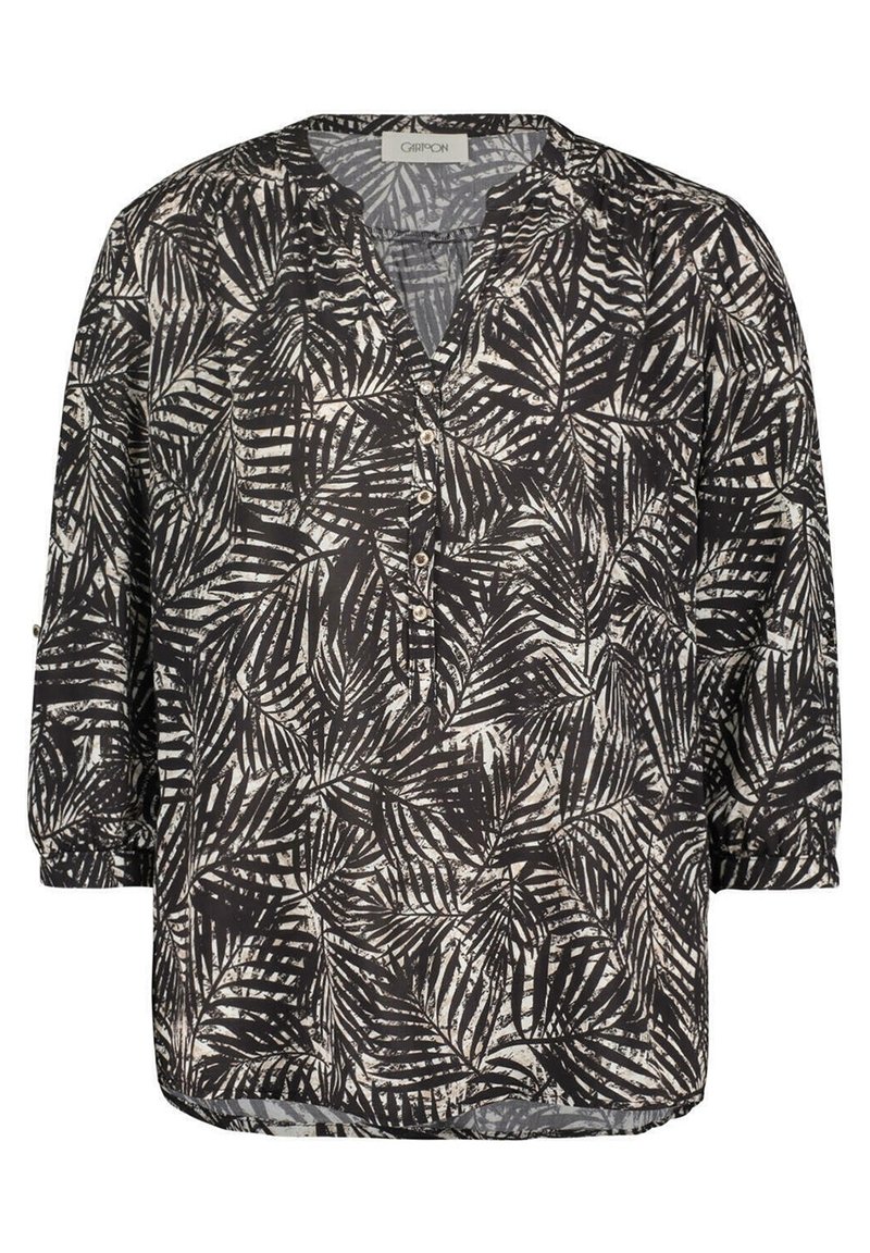 Black and beige blouse featuring a leaf print, loose fit, v-neckline, and three-quarter sleeves with button details. Lightweight, textured fabric.