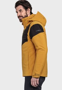 Schöffel KANZELWAND - Regenjacke / wasserabweisende Jacke - gelb