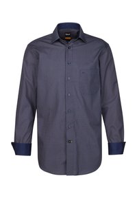 Camicia blu navy con un motivo geometrico, maniche lunghe, colletto a punta e polsini blu navy a contrasto. Presenta una tasca sul petto.