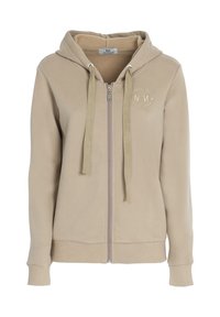 Felpa con zip beige, dotata di cappuccio, cordino in velluto e polsini a coste. Presenta un logo circolare sul petto e un morbido interno in pile.