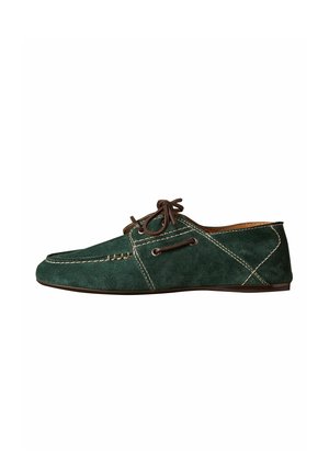 Dark green suede moccasin-style shoe with brown laces and contrasting white stitching on a white background.