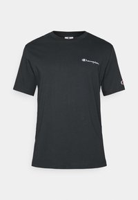 Schwarzbaum Baumwoll-T-Shirt mit kurzen Ärmeln, Rundhalsausschnitt, mit einem weißen "Champion"-Logo auf der Brust und einem kleinen Logo auf dem Ärmel.