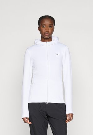 Weiße Zip-Hoodie mit Kapuze, aus glattem Material, mit einem kleinen schwarzen Logo auf der Brust und zwei Fronttaschen.