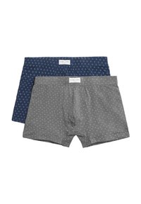 Un par de calzoncillos para hombre en color azul marino con un patrón de diamantes y otro en gris con un pequeño patrón de corazones, fabricados en un tejido suave y elástico.