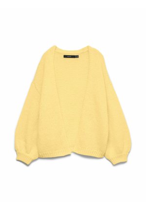 Cardigan jaune tricoté doux et oversize avec ouverture à l'avant et manches bouffantes, présenté à plat sur un fond blanc.