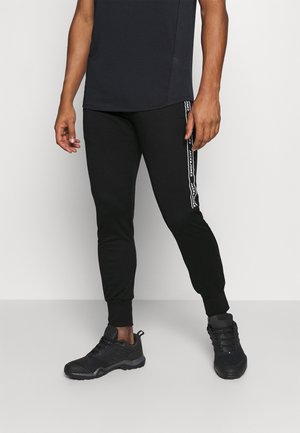 JCOZHALF TAPE PANTS - Tracksuit bottoms - black