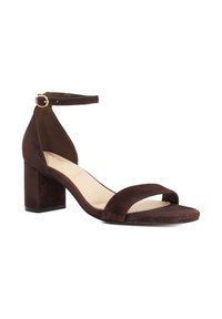 Brown suede high-heeled sandal with an ankle strap featuring a gold buckle. Open toe design and block heel for added stability.
