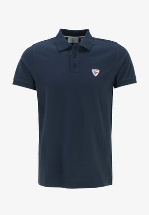 Marineblaues Polohemd aus Baumwolle. Mit Kragen, Knopfleiste mit drei Knöpfen und einem kleinen gestickten Logo auf der linken Brust.