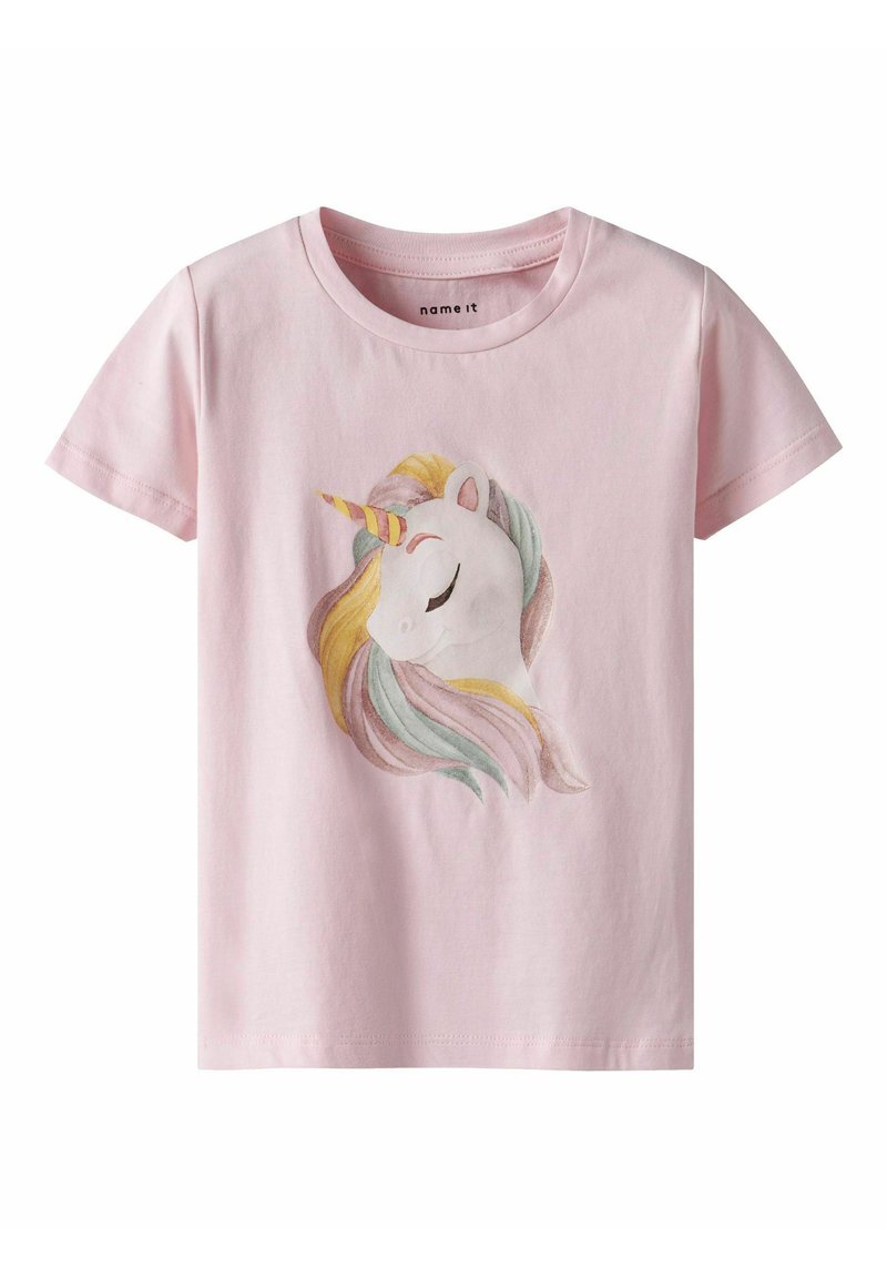T-shirt en coton rose clair avec un motif de licorne ayant une crinière multicolore et une corne dorée. Manches courtes, col rond.