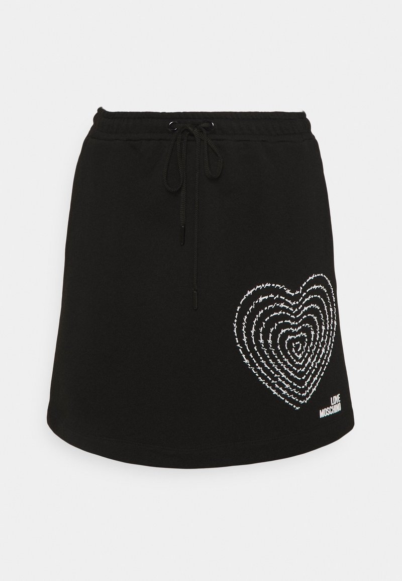 Jupe noire avec taille élastique et cordon de serrage, présentant un dessin de cœur concentrique blanc et le texte "Love Moschino" en bas à droite.