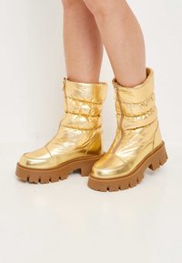 Cesare Gaspari Botas para la nieve - gold-coloured