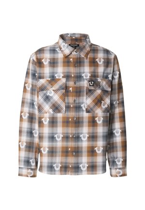 Hnědá a tmavě modrá kostkovaná košile na zapínání na knoflíky s dvěma předními kapsami a detailem s logem. Vyrobena z texturované látky s károvaným vzorem.