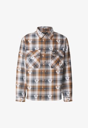 Hnědá a tmavě modrá kostkovaná košile na zapínání na knoflíky s dvěma předními kapsami a detailem s logem. Vyrobena z texturované látky s károvaným vzorem.