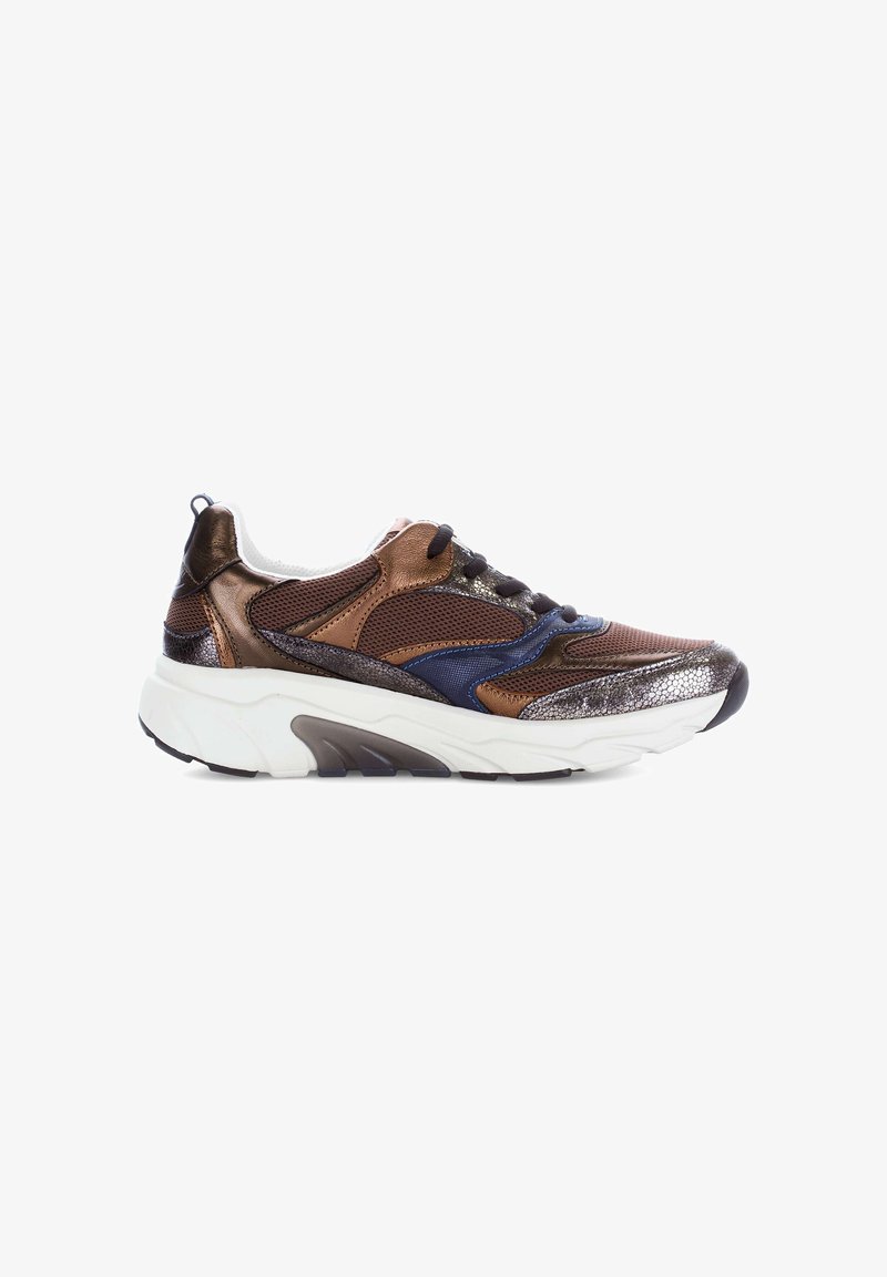 Brown and navy athletic shoe featuring mesh and metallic accents, thick white sole, round toe, and black laces. Textured surface details.