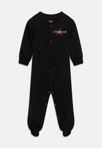 Monosie de algodón negro para bebé con mangas largas, cierre de botones de presión, cuello redondeado, con un logo de Jordan en rojo y blanco en el pecho.